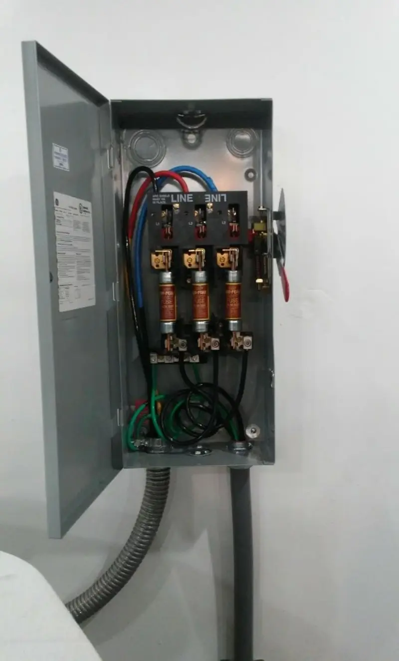 Three-phase disconnect switch installed for Smoke Detector Installation in Galveston